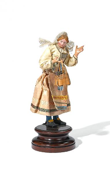 Appraisal: An Italian cr che figure of a woman with a