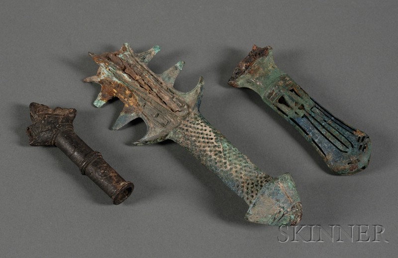 Appraisal: Three Archaic Bronze Dagger Hilts lg to in