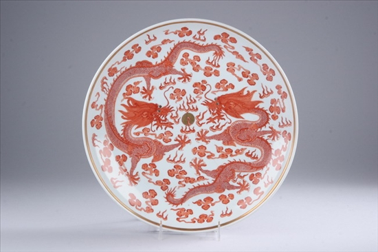 Appraisal: CHINESE IRON RED AND WHITE PORCELAIN DRAGON CHARGER Guangxu mark