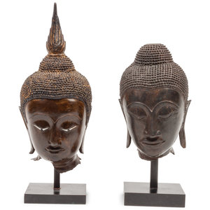 Appraisal: A Group of Two Southeast Asian Bronze Deity Heads on