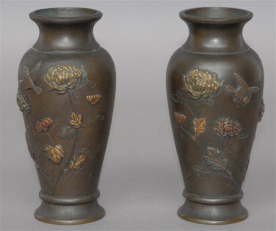 Appraisal: A PAIR OF ANTIQUE ORIENTAL BRONZE VASES Having floral and