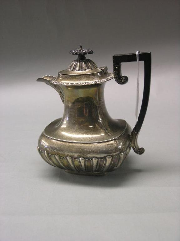 Appraisal: An Edward VII silver coffee pot half-gadrooned form with ebony