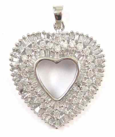 Appraisal: DIAMOND AND WHITE GOLD HEART PENDANT The k white gold