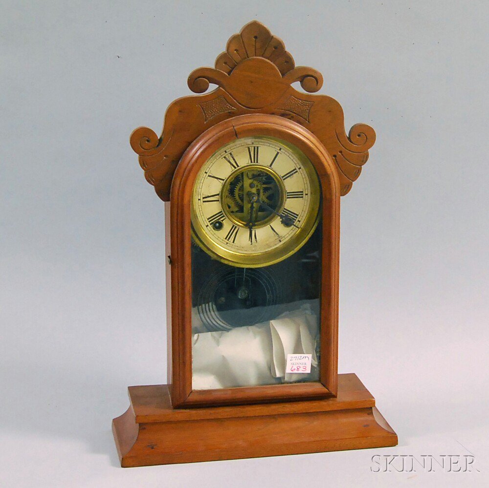 Appraisal: E Ingraham Co Walnut Shelf Clock Bristol Connecticut the carved