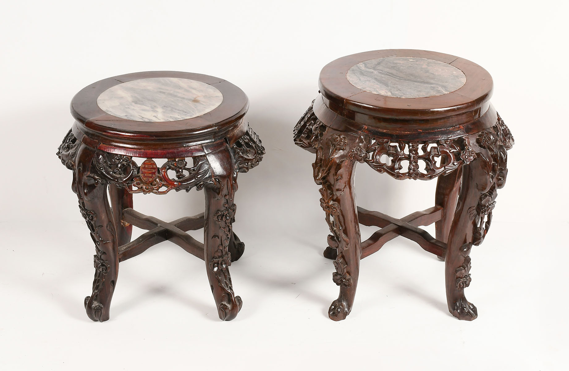 Appraisal: CARVED CHINESE MARBLE TOP JARDINIERE STANDS Two elaborately carved Chinese