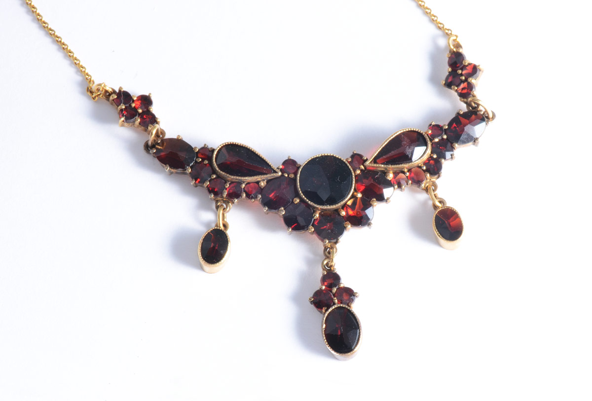 Appraisal: FANCY GARNET NECKLACE AND RING K yellow gold necklace of