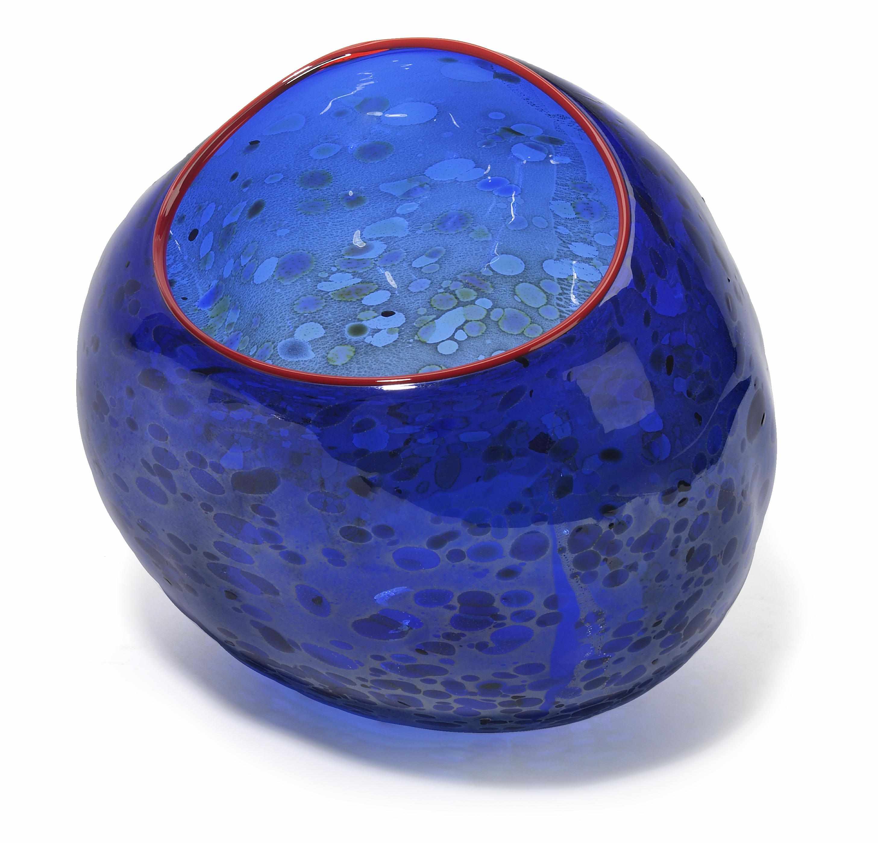 Appraisal: A Dale Chihuly blue glass basket with red lip wrap