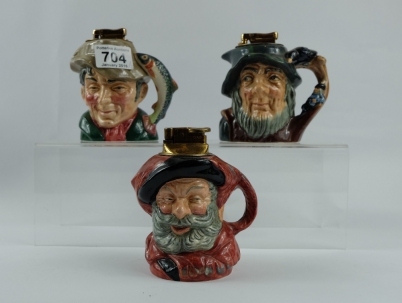 Appraisal: Royal Doulton small character table lighters comprising of The Poacher