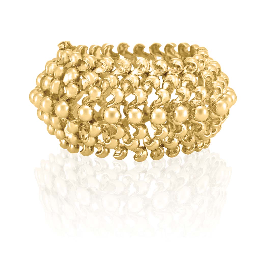 Appraisal: Wide Gold Bracelet The wide openwork mount centering a continuous