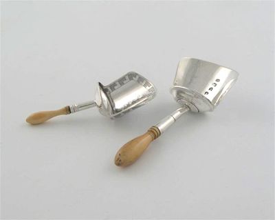 Appraisal: Two George III ivory handled caddy scoops one with engraving