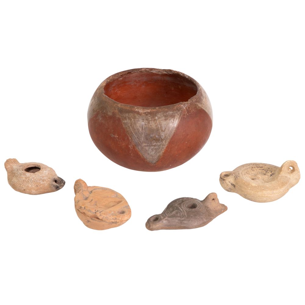 Appraisal: ROMAN AND PTOLEMAIC STYLE POTTERY OIL LAMPS items including a