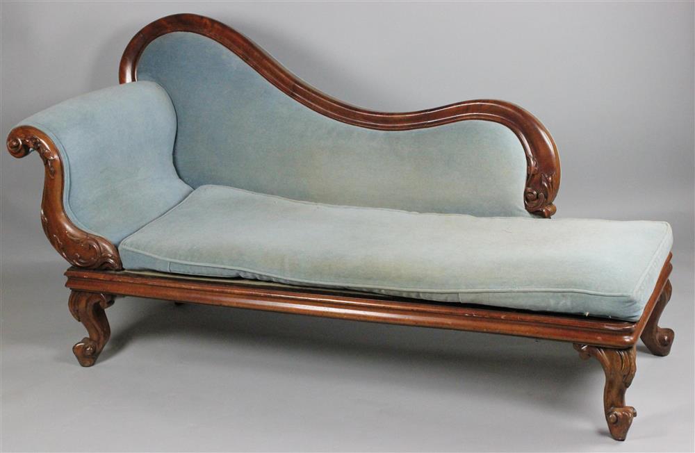 Appraisal: VICTORIAN WALNUT RECAMIER WITH BLUE VELVET UPHOLSTERY having a molded