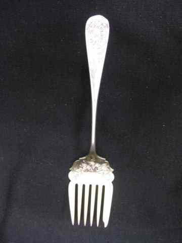 Appraisal: Victorian Sterling Silver Chipped Beef Fork elaborate floral Art Nouveau