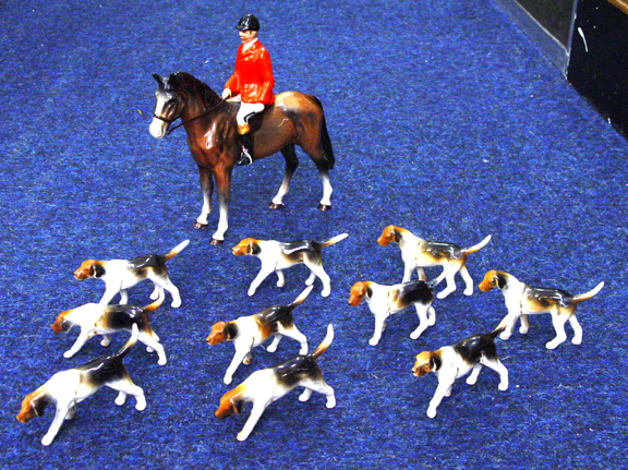 Appraisal: Hand painted Beswick style huntsman on horseback together with ten