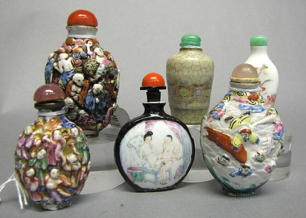 Appraisal: A group of six famille rose enameled snuff bottles Including