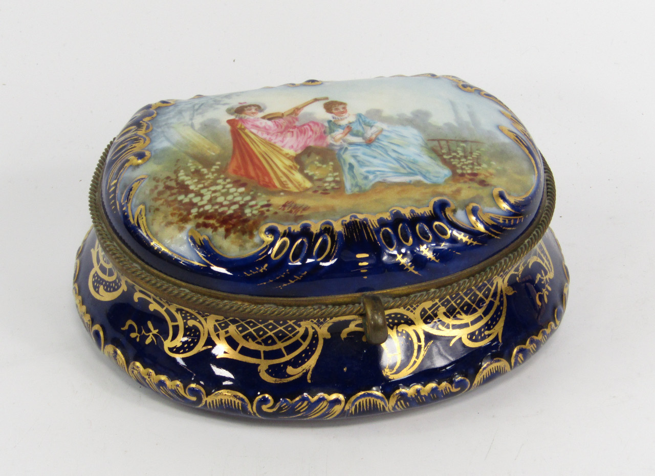 Appraisal: A Sevres style porcelain demi lune box and hinged cover