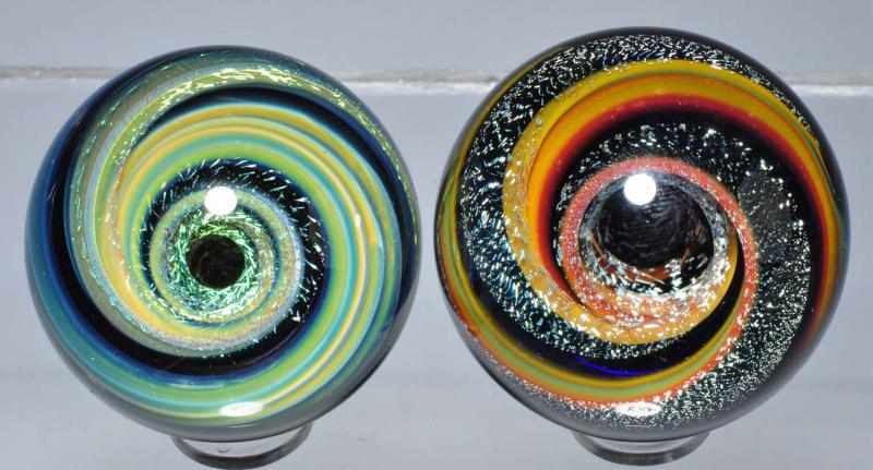 Appraisal: Lot of Filip Vogelpohl Marbles Description Includes one Vortex with