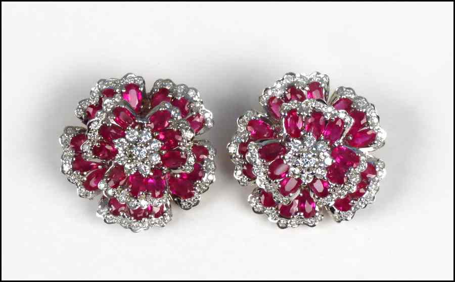 Appraisal: PAIR OF RUBY DIAMOND AND KARAT WHITE GOLD EARCLIPS diamonds