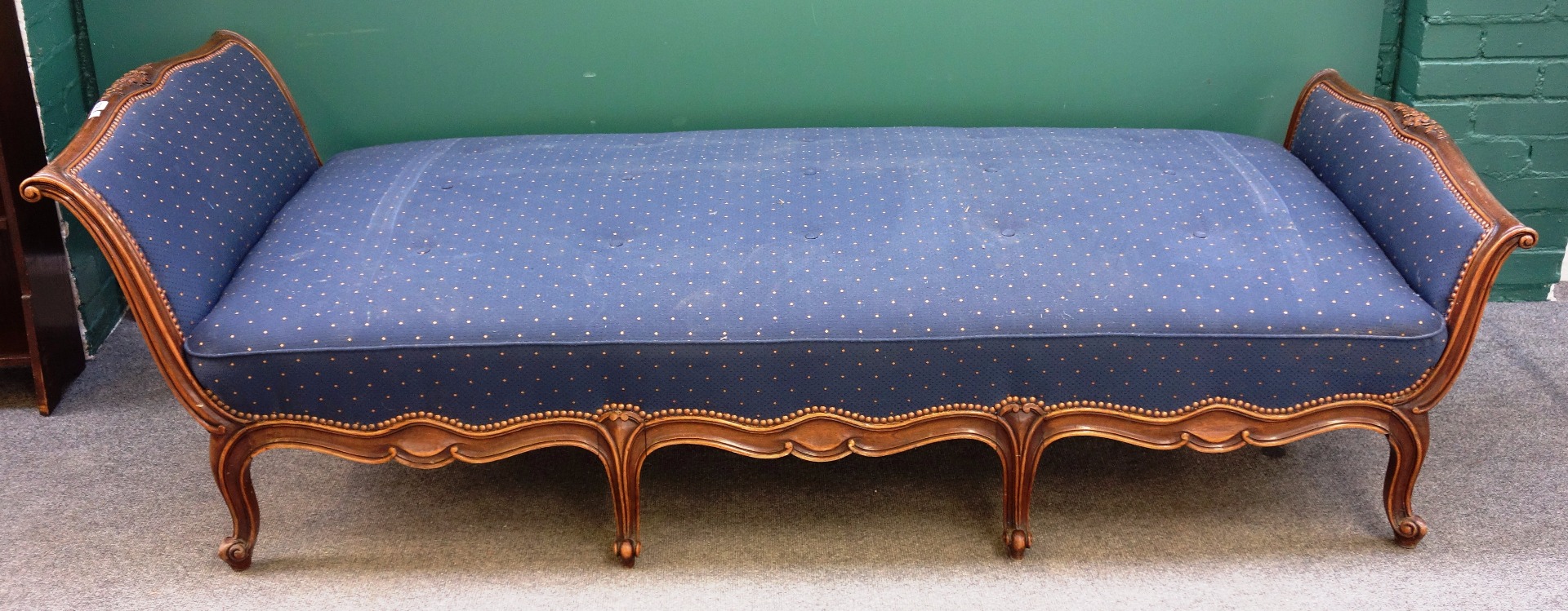 Appraisal: A Louis XV style walnut framed scroll end day bed