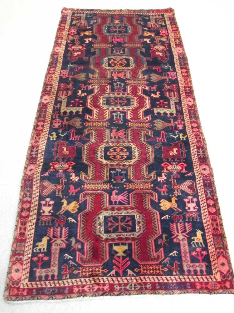 Appraisal: SEMI-ANTIQUE PERSIAN TRIBAL AREA RUG five geometric medallion and stylized