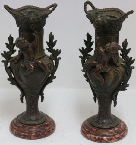 Appraisal: PAIR OF LATE TH CENTURY BRONZE FINISHED METALURNS WITH MALE