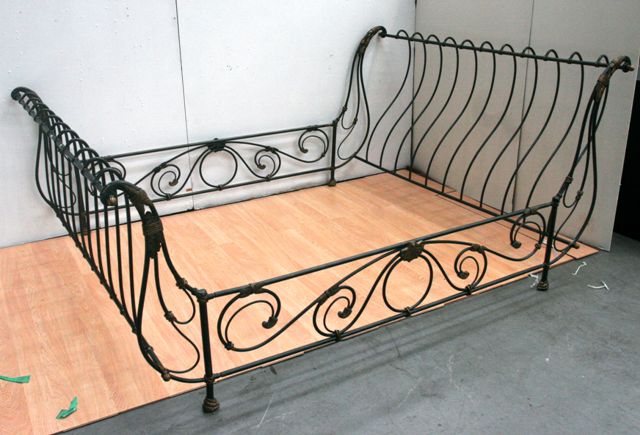 Appraisal: A wrought iron bed frame in the Art Nouveau taste