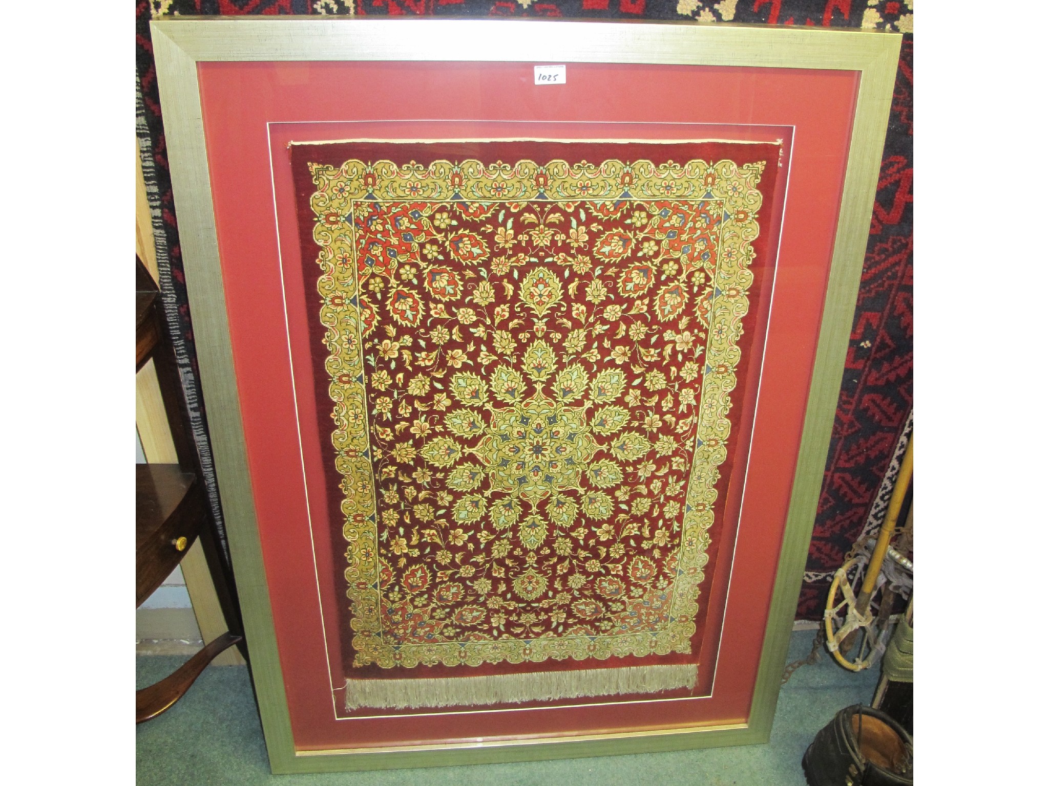 Appraisal: A framed prayer mat in glazed frame