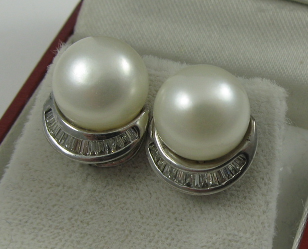 Appraisal: PAIR OF PEARL AND FOURTEEN KARAT GOLD EARRINGS each white