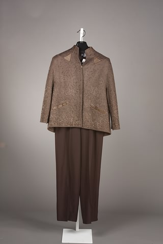 Appraisal: CHADO Brown wool leather ascots detail jacket with brown slacks