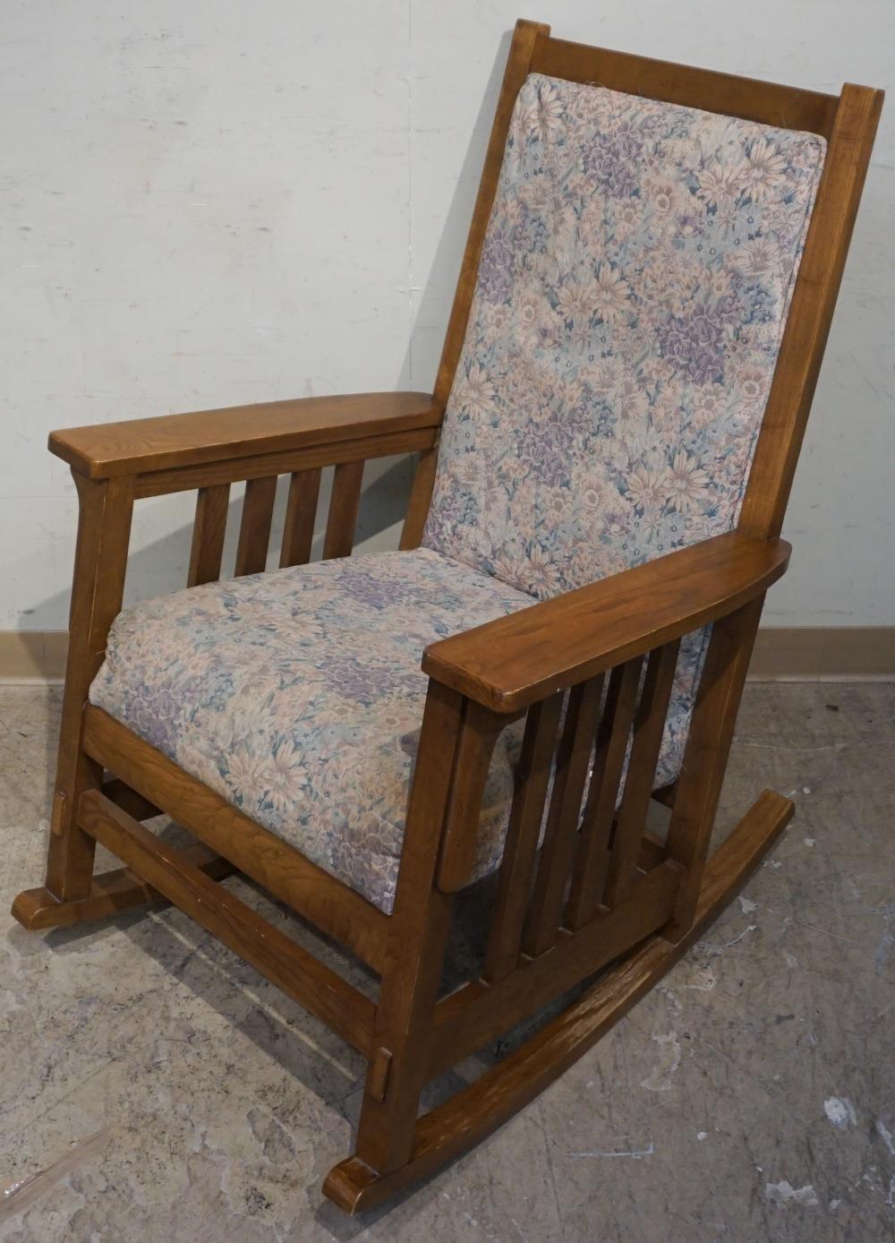 Appraisal: ARTS AND CRAFTS STYLE OAK AND UPHOLSTERED ARM ROCKERArts and