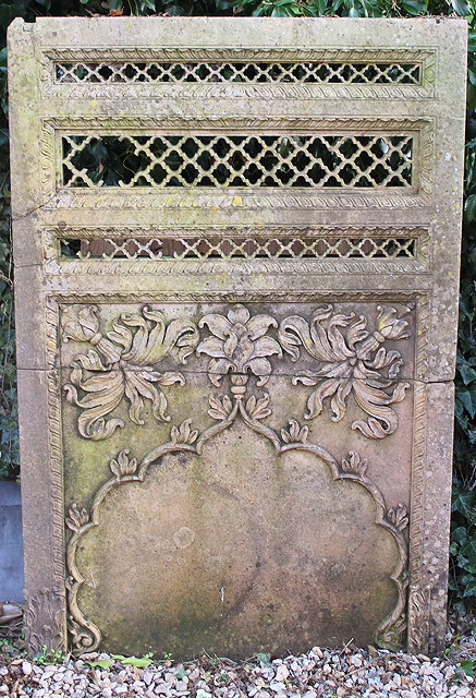 Appraisal: A MOGUL INDIAN SANDSTONE PARTITIONING SCREEN with pierced fretwork panels