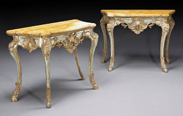 Appraisal: A pair of Italian Rococo silver gilt console tables mid