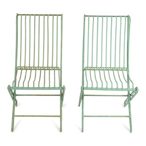 Appraisal: A Set of Four Green Painted Wrought Iron Folding Chairs