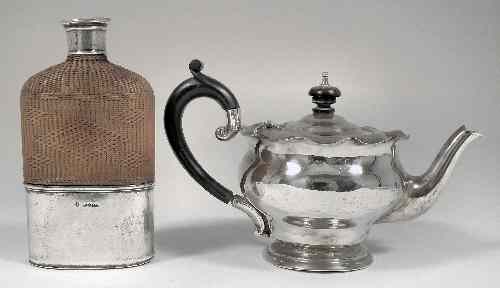 Appraisal: An Edward VII bachelor's silver teapot with plain rim and