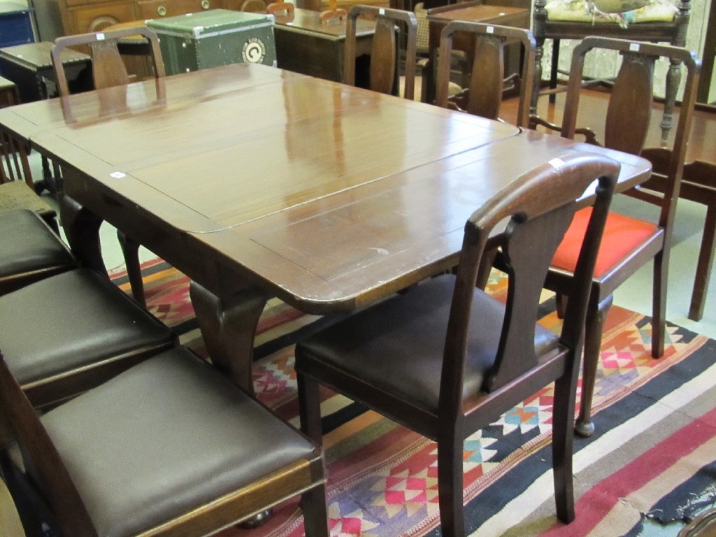 Appraisal: Mahogany pull out dining table with eight dining chairs