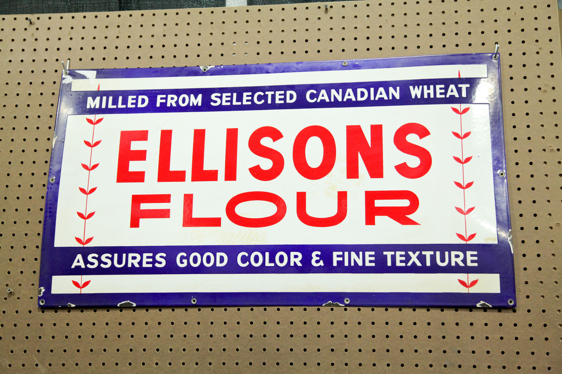 Appraisal: ENAMELED ADVERTISING SIGN Probably Canadian mid th century Red white