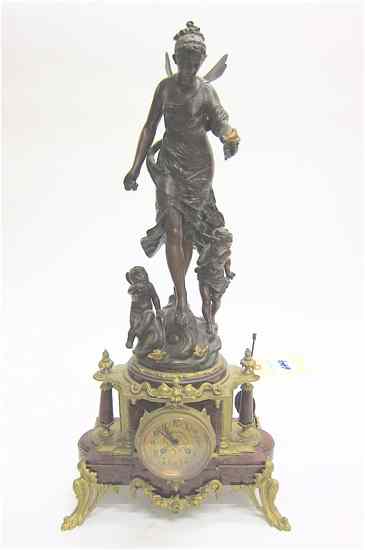 Appraisal: SPELTER AND ROSE MARBLE STATUE CLOCK French th century the