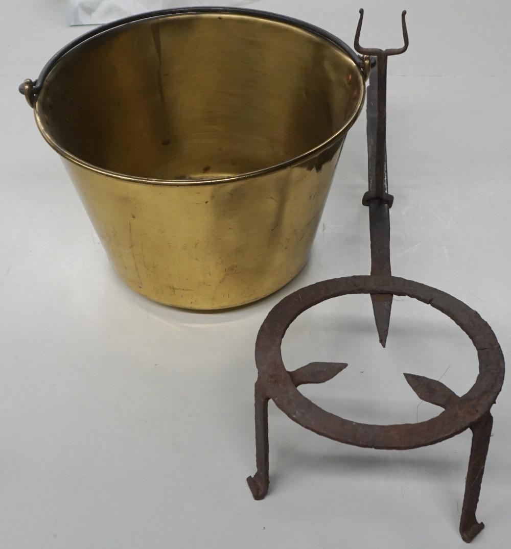 Appraisal: BRASS BAIL HANDLE BUCKET AND IRON TRIVETBrass Bail Handle Bucket