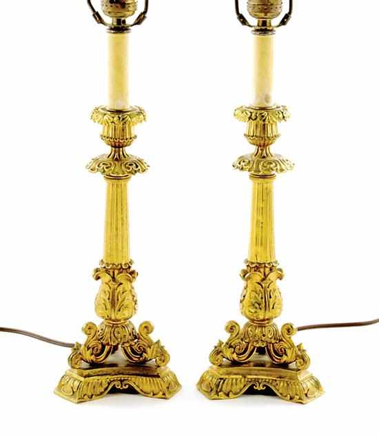 Appraisal: Pair French gilt-bronze candlesticks late th century anthemion and scroll