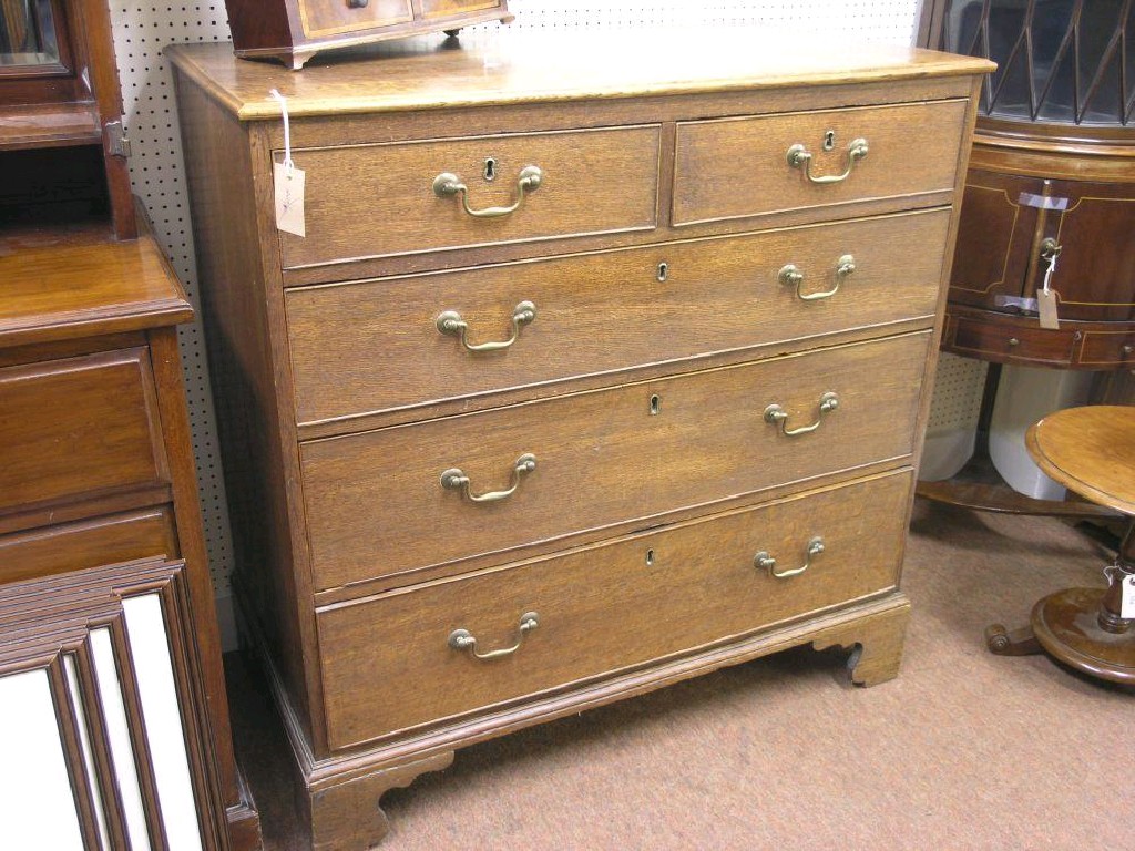 Appraisal: A George III oak chest two short and three long