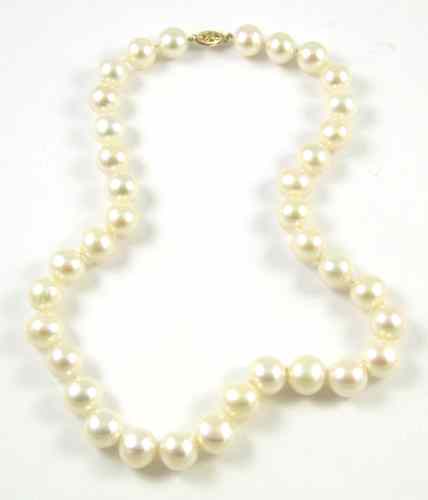 Appraisal: PRINCESS LENGTH PEARL NECKLACE strung with well matched white pearls