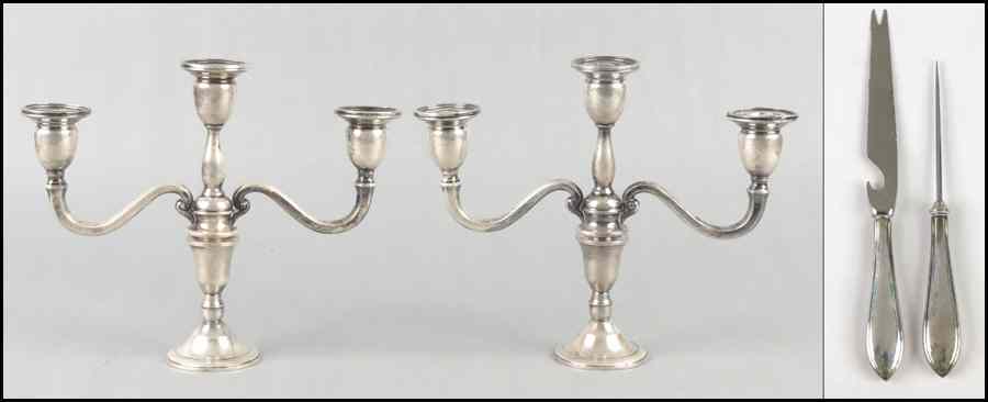 Appraisal: PAIR OF WEIGHTED STERLING SILVER THREE-LIGHT CANDELABRA Top comes off