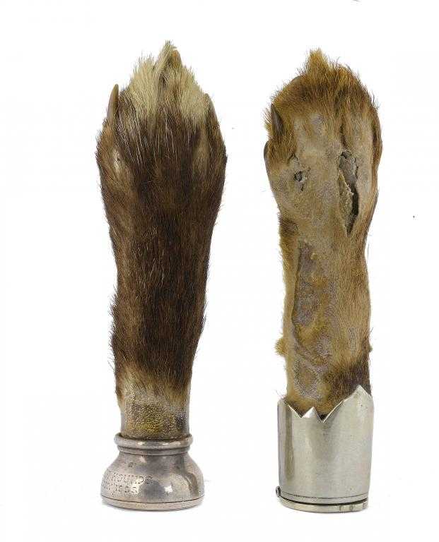 Appraisal: A VICTORIAN SILVER-MOUNTED FOX'S PAW DESK SEAL with fox intaglio