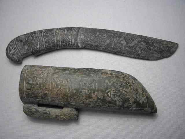 Appraisal: Chinese carved stone dagger with sheath in the Archaic style