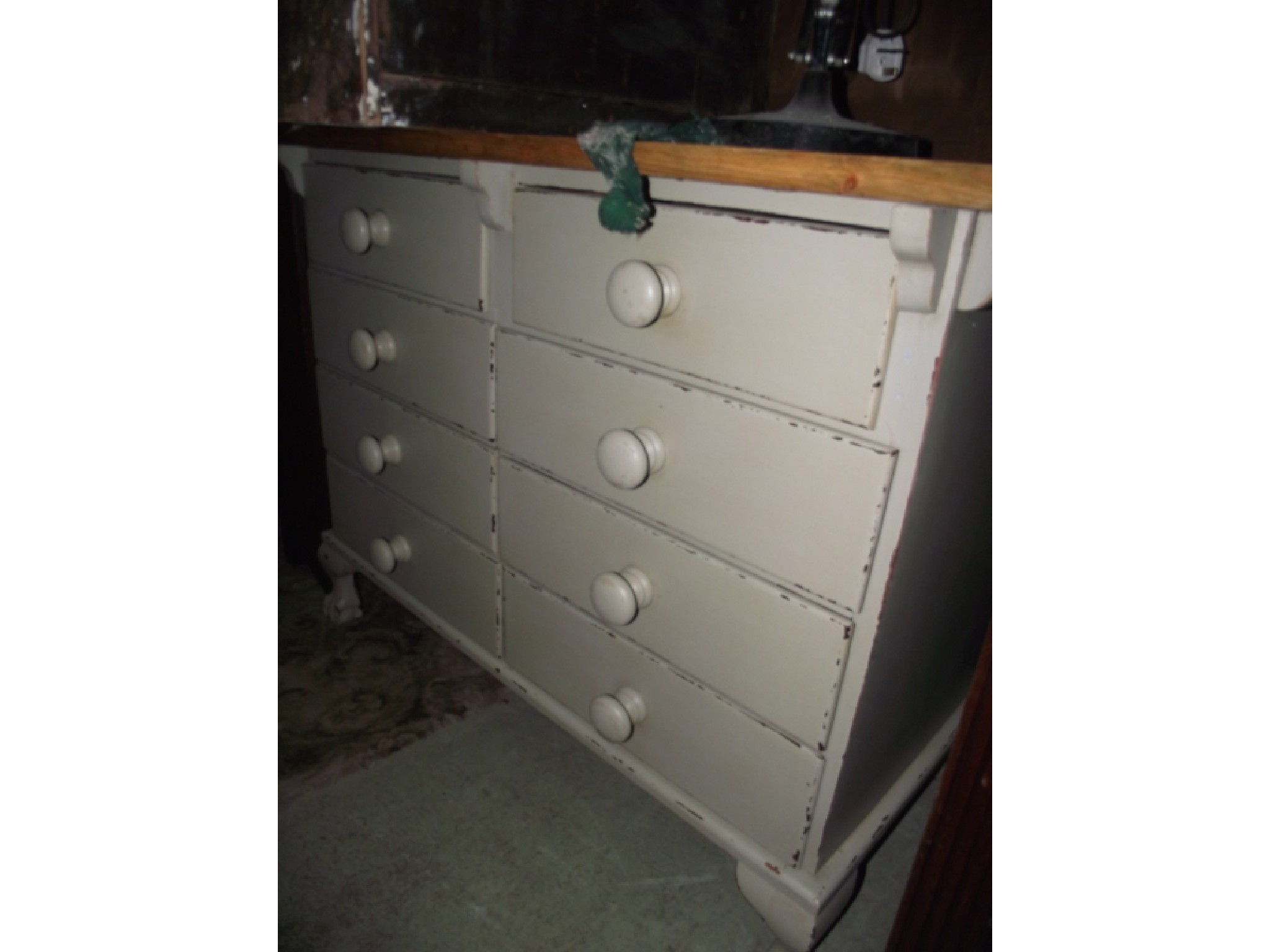 Appraisal: A painted pine chest fitted with two towers of four