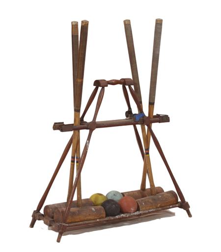 Appraisal: An early th century croquet set and stand By F