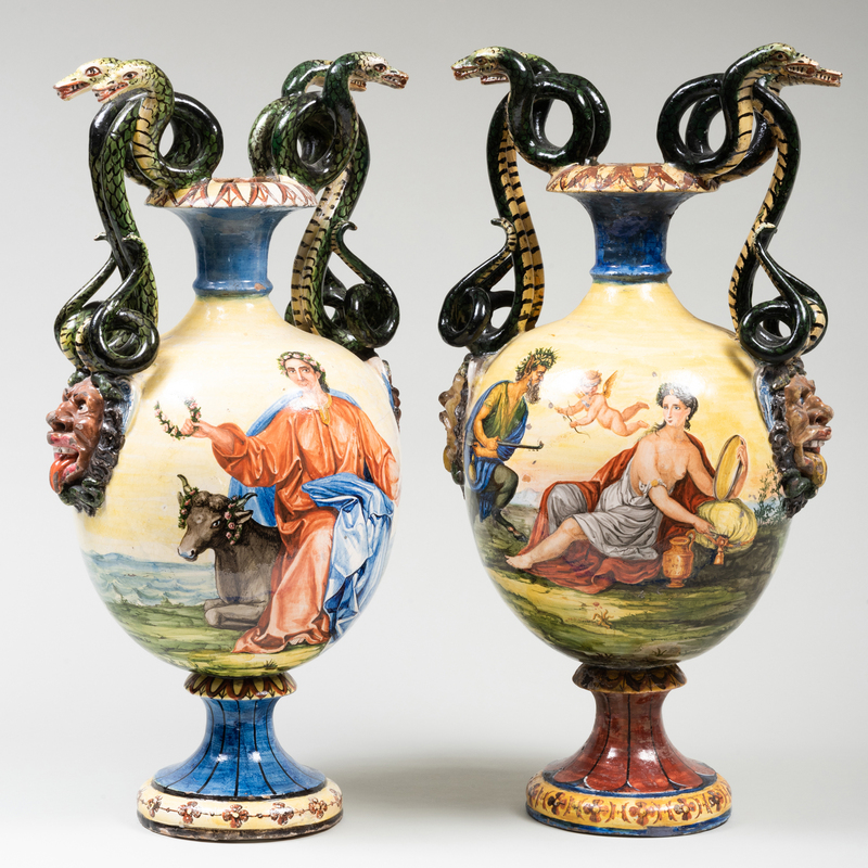 Appraisal: PAIR OF CONTINENTAL MAJOLICA TWIN SNAKE HANDLE VASES DECORATED WITH