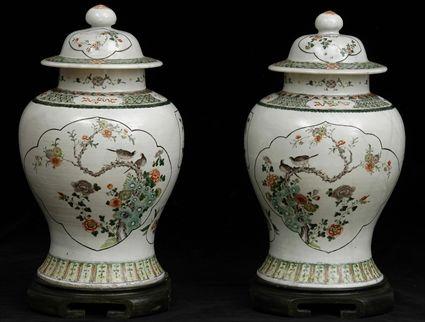 Appraisal: PAIR OF CHINESE FAMILLE VERTE PORCELAIN BALUSTER-FORM JARS AND COVERSEach