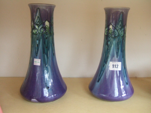 Appraisal: A pair of Mintons Ltd Arts Crafts vases with stylised