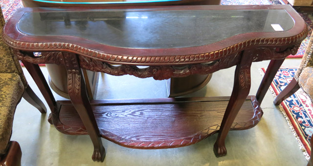 Appraisal: CHIPPENDALE STYLE CARVED MAHOGANY CONSOLE TABLE a serpentine-shaped -tier design